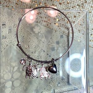 Silver turtle,heart and stone bracelet.